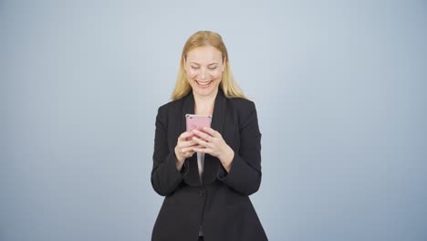 Business-woman-texting-on-the-phone.-Happy-emoticon.